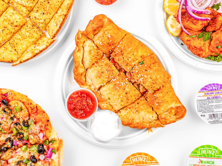 Calzone Corner Takeout & Tiffin Service serving Redstone Calgary