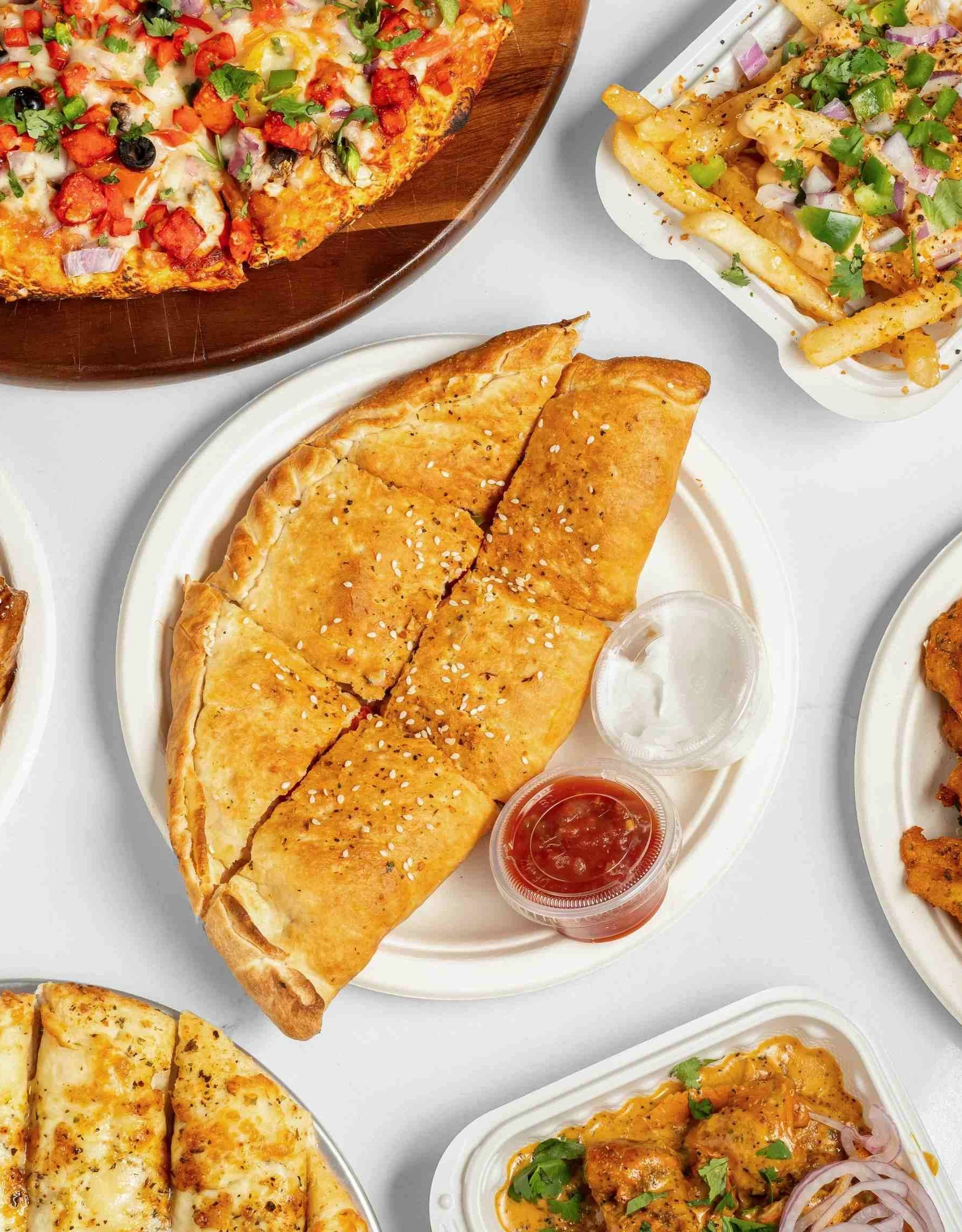 Calzone Corner Takeout & Tiffin Service kitchen at 10980 38 Street NE in Calgary