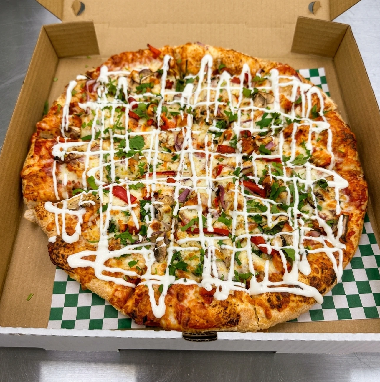 Butter Chicken Punjabi Pizza - Best Punjabi pizza in Calgary NE at Calzone Corner